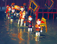 Szene des Wasserpuppentheaters in Hanoi